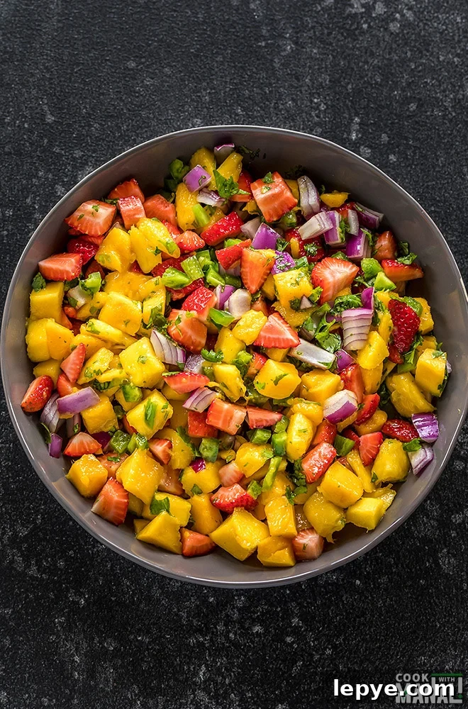 strawberry mango salsa in a large grey bowl