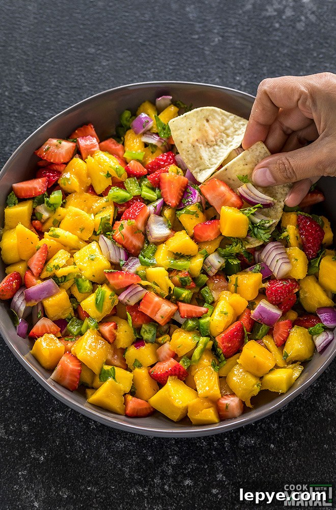 strawberry mango salsa in a large grey bowl