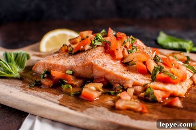 Pomodoro Salmon Bruschetta: Tomato & Herb Topping on Crispy Bread 3 close-up of easy bruschetta salmon on a wooden cutting board