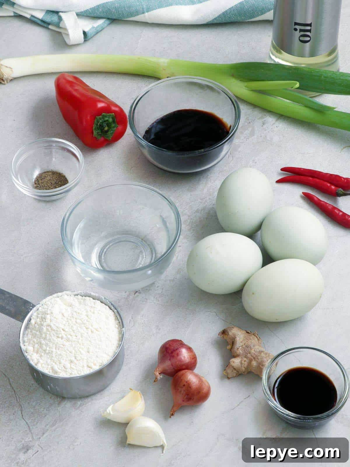 Sizzling Balut: How to Cook Crispy Filipino Balut Skillet 3 balut, flour, chili peppers, bell pepper, onions, garlic, ginger, oyster sauce, green onions