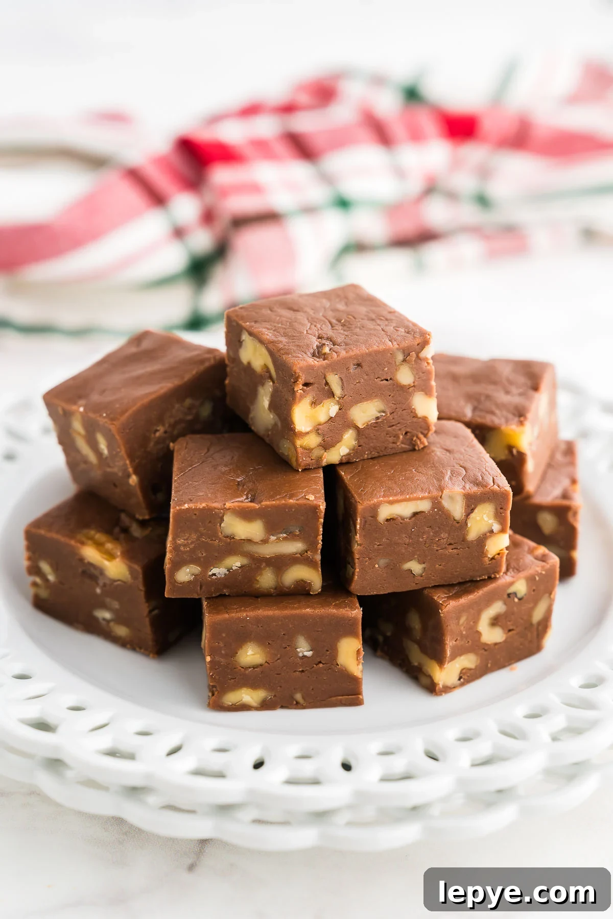Velveeta Fudge Recipe: Creamy Sweet Cheesecake-Style Fudge 2 velveeta fudge stacked on a plate