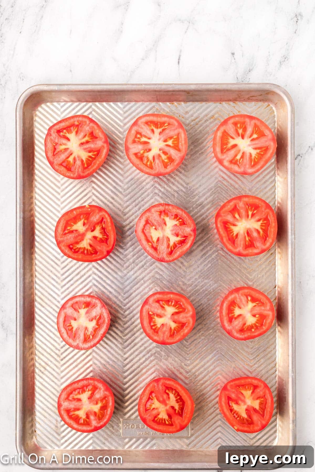 Smoked Tomato Recipe: How to Smoke Tomatoes for Rich Flavor 4 Slice fresh tomatoes on a baking sheet