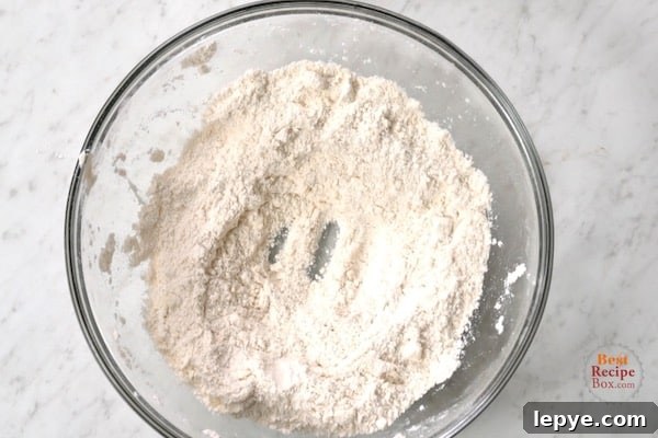 One-Bowl Garlic Cheddar Drop Biscuits Recipe 4 Butter and flour pinched together in a bowl