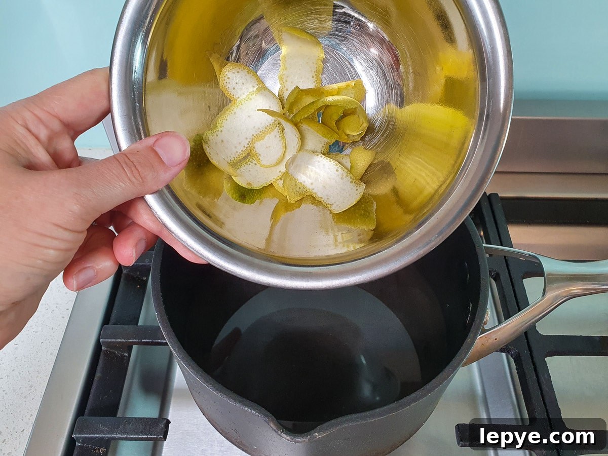 Refreshing Lime Popsicle Recipe: Homemade Citrus Ice Pops 7 Adding lime zest to pot.