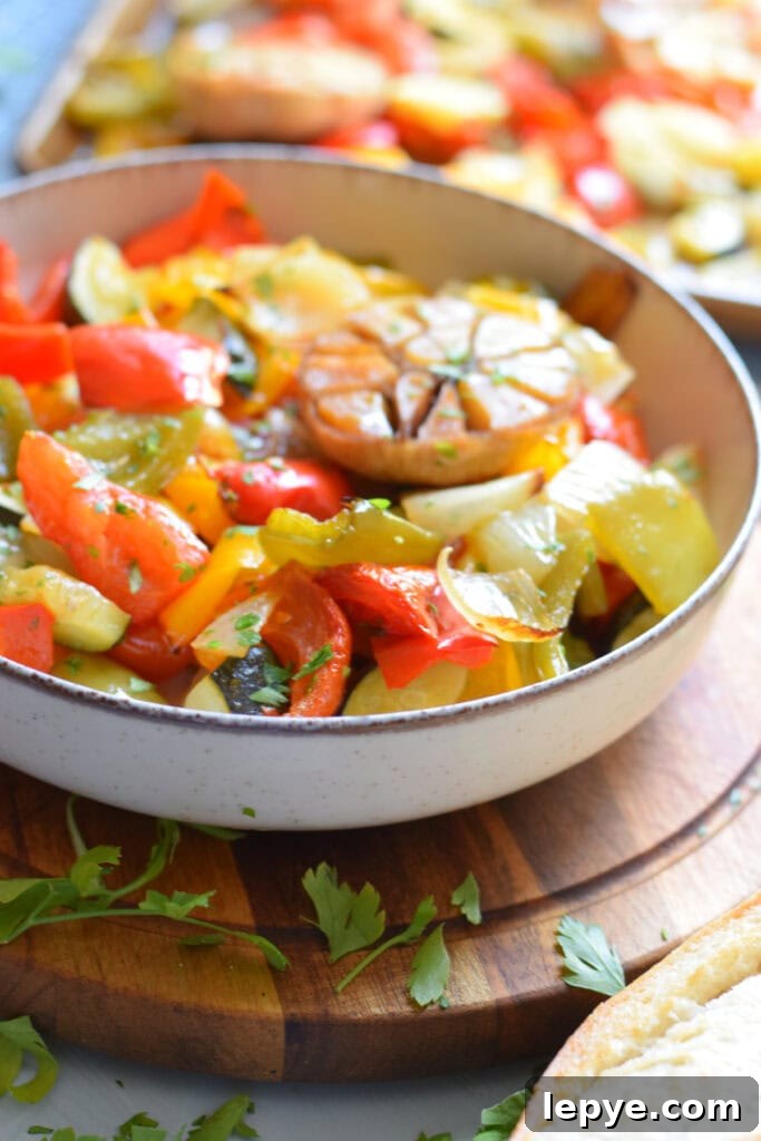 Mediterranean Sheet Pan Roasted Vegetables for Weeknight Meals 3 Sheet pan vegetables in a bowl.
