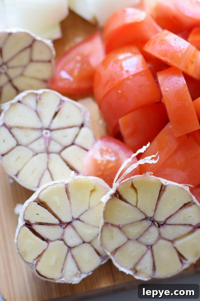 Mediterranean Sheet Pan Roasted Vegetables for Weeknight Meals 7 Cut garlic bulbs up close.