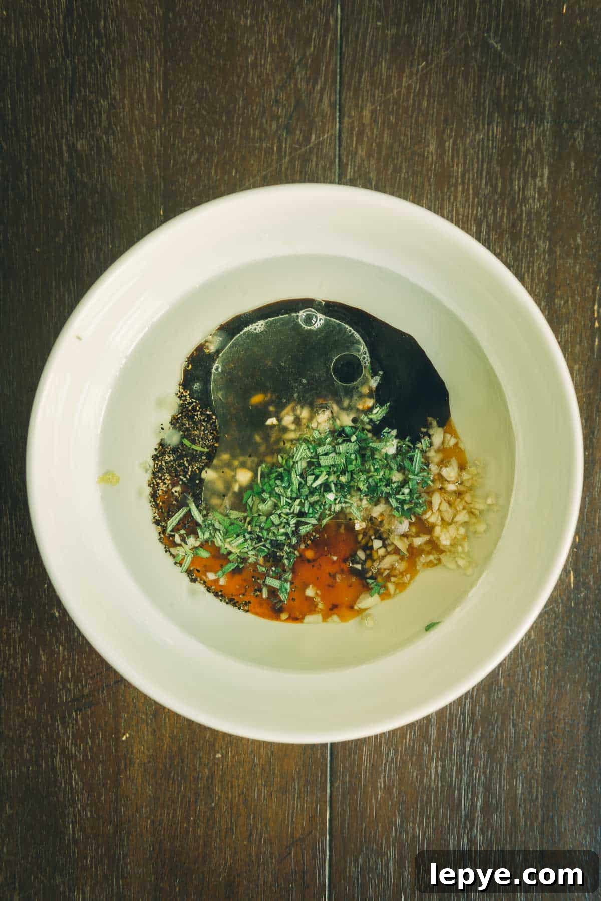 Garlic Herb Pork Chop Marinade for Juicy, Flavorful Chops 4 All the marinade ingredients in a bowl.