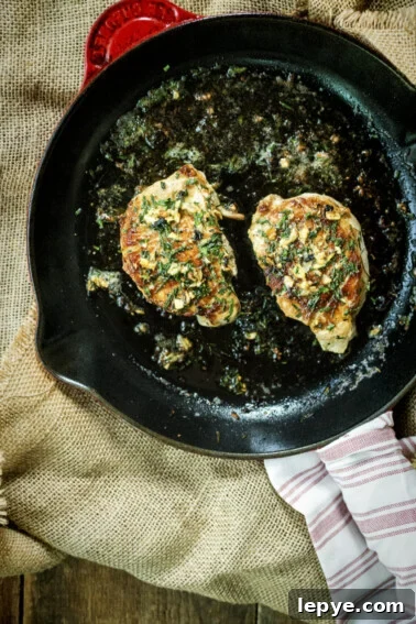 Garlic Herb Pork Chop Marinade for Juicy, Flavorful Chops 8 Quick Thick-Cut Pan Seared Pork Chops | Kita Roberts GirlCarnivore.com