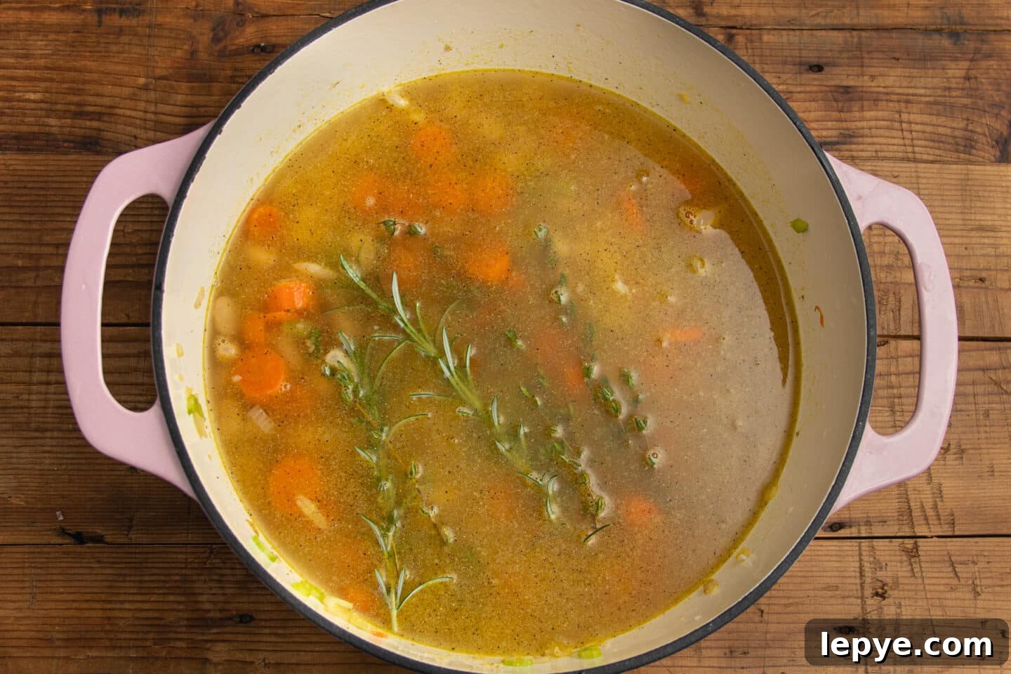 This is a picture of the large pot with broth and herbs added.