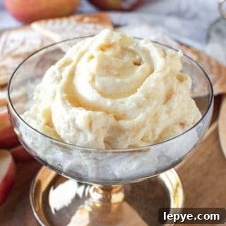 sweet ricotta on a board with apple slices and pizzelle