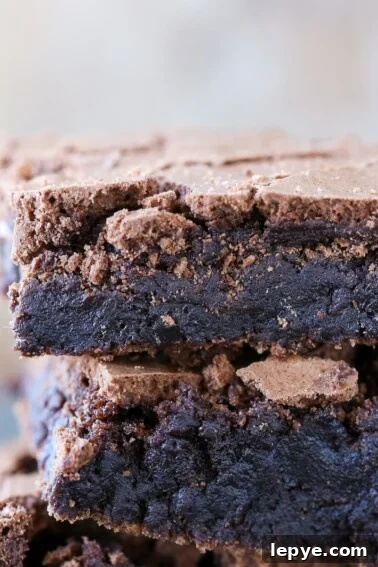 Fudgy Banana Brownies Made with Ripe Bananas 17 Browned Butter Brownie stacked detailed texture.