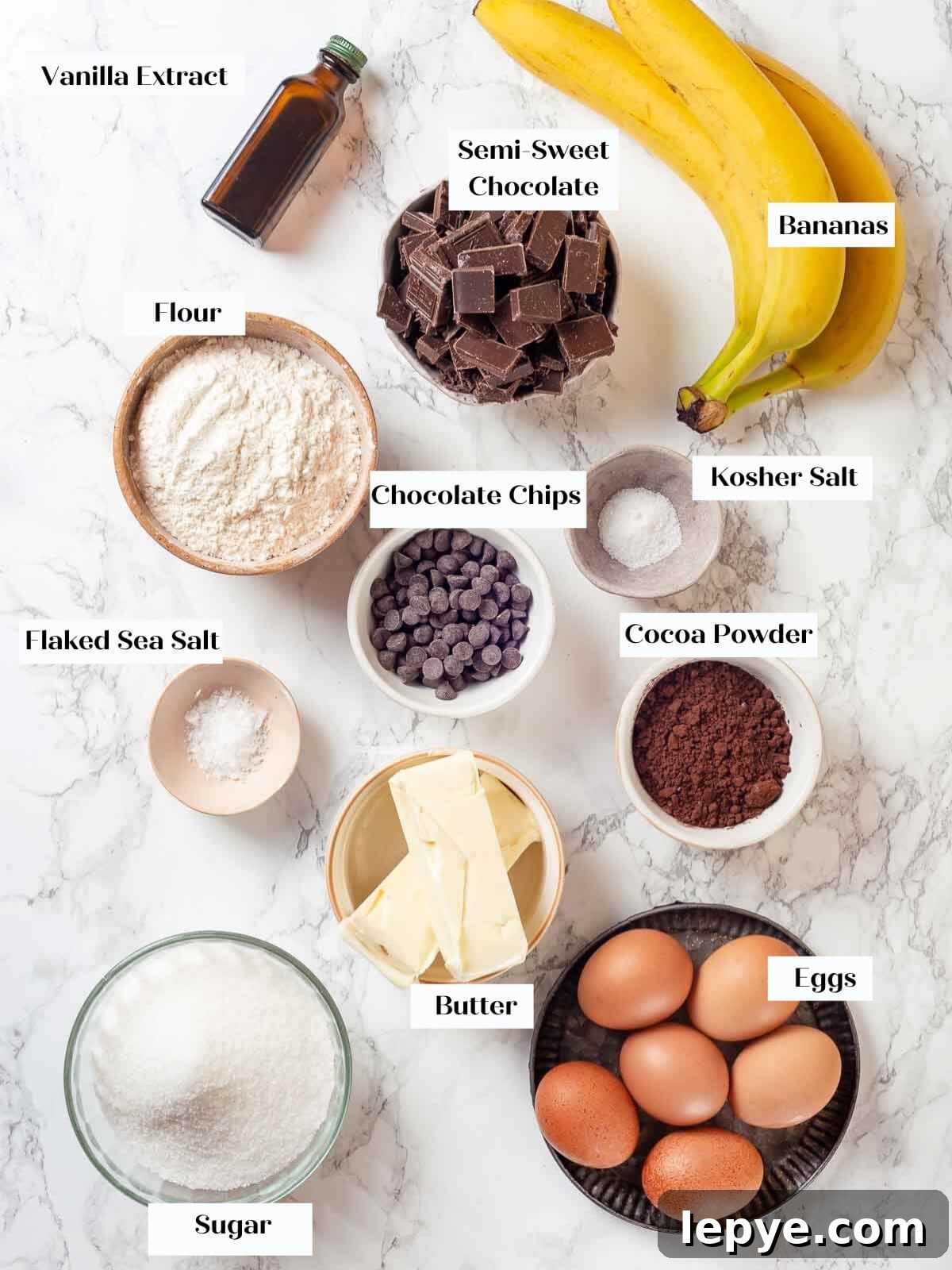 Fudgy Banana Brownies Made with Ripe Bananas 4 Ingredients for banana brownies on a white countertop.