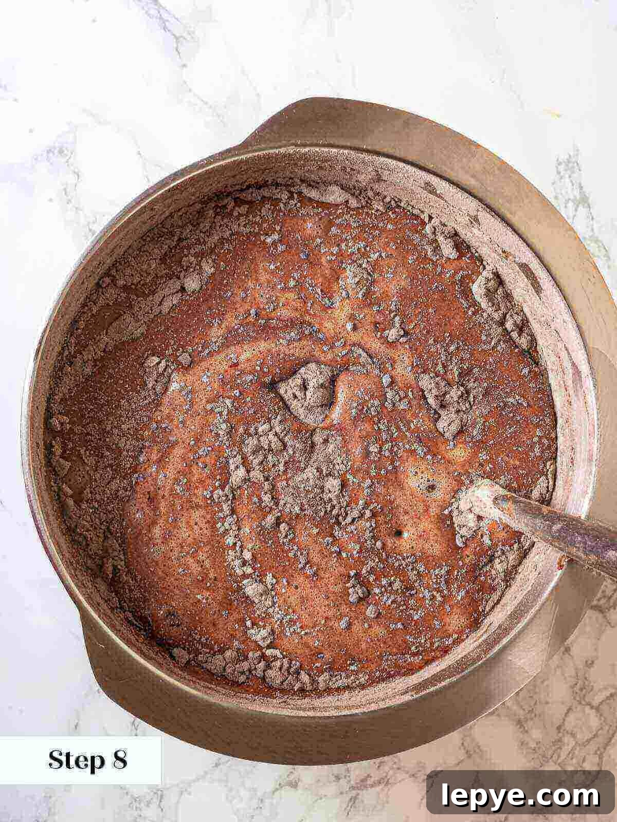 Fudgy Banana Brownies Made with Ripe Bananas 10 Adding flour mixture to banana brownies.