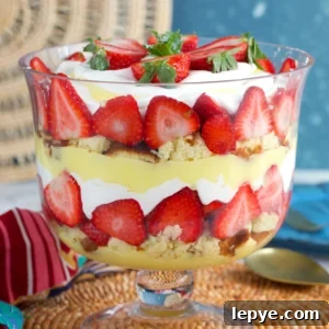 Strawberry Trifle Recipe with Layered Cream and Fresh Berries 7 Strawberry Trifle layered in a trifle bowl.
