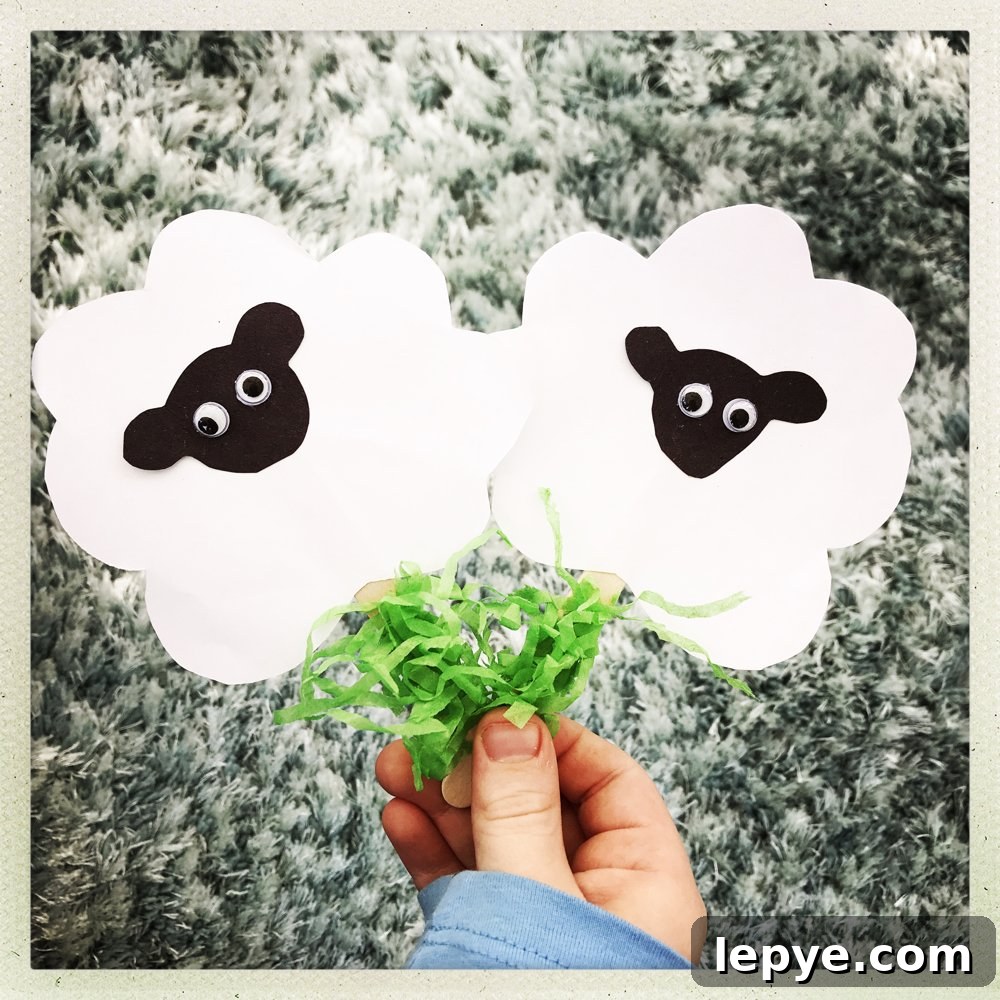 Chinese Dragon Mask Craft for Kids: Step-by-Step Paper Mask Tutorial 13 small child holding up two child made sheep pop up puppets on lolly sticks.