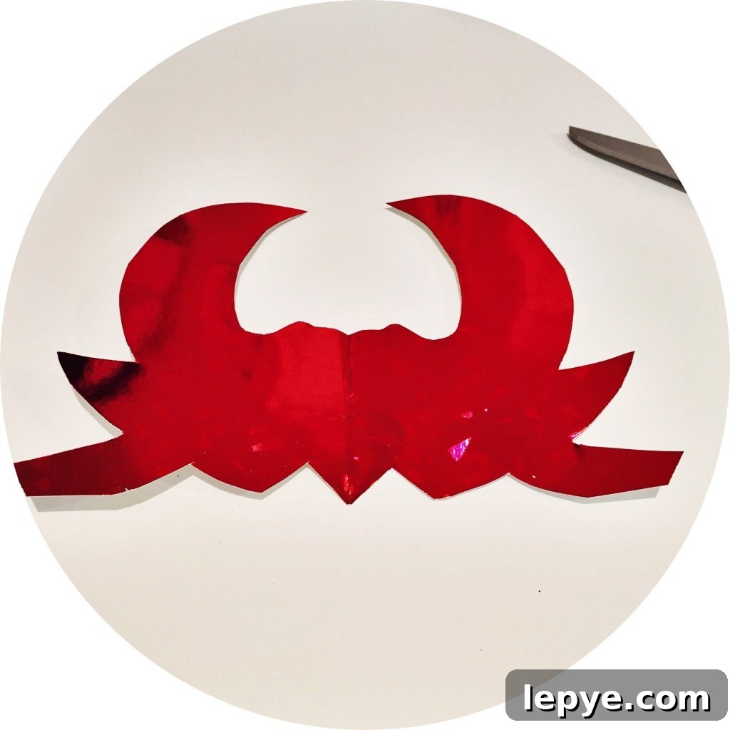 Chinese Dragon Mask Craft for Kids: Step-by-Step Paper Mask Tutorial 5 red horns cut out of shiny red card