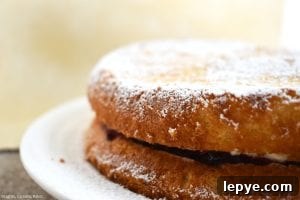 Fluffy Egg Yolk Sponge Cake Recipe with Silky Texture 5 Egg Yolk Sponge Cake is a super light and fluffy sponge relying on egg yolks as the base which delivers a rich and fluffy sponge. Filled with whipped cream and jam, dusted with icing sugar and you have a classic sponge cake for dessert, morning tea or just for fun. #eggyolkspongecake #spongecake #spongecakerecipe #easycakerecipe