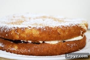 Fluffy Egg Yolk Sponge Cake Recipe with Silky Texture 6 Egg Yolk Sponge Cake is a super light and fluffy sponge relying on egg yolks as the base which delivers a rich and fluffy sponge. Filled with whipped cream and jam, dusted with icing sugar and you have a classic sponge cake for dessert, morning tea or just for fun. #eggyolkspongecake #spongecake #spongecakerecipe #easycakerecipe