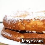 Fluffy Egg Yolk Sponge Cake Recipe with Silky Texture 7 Egg Yolk Sponge Cake is a super light and fluffy sponge relying on egg yolks as the base which delivers a rich and fluffy sponge. Filled with whipped cream and jam, dusted with icing sugar and you have a classic sponge cake for dessert, morning tea or just for fun. #eggyolkspongecake #spongecake #spongecakerecipe #easycakerecipe