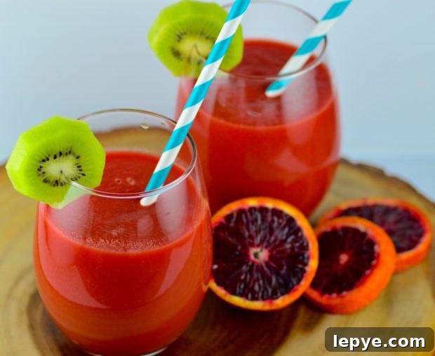 Refreshing Green Smoothie Recipe for Energy and Immunity 5 Fight the sniffles with this vitamin packed winter smoothie - glass of smoothie with garnish
