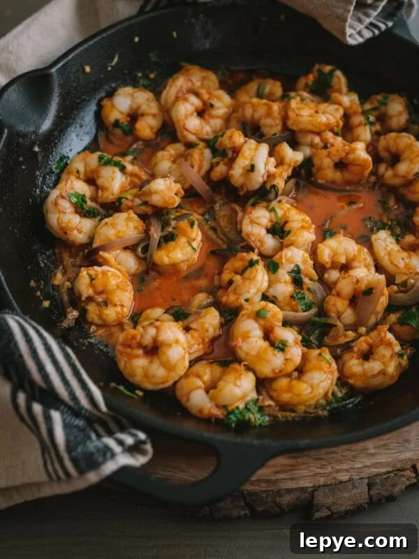 Mexican Shrimp Cocktail Recipe: Zesty Camarones en Coctel 11 Camarones al Mojo de Ajo (Mexican-Style Garlic Shrimp) in a cast iron skillet