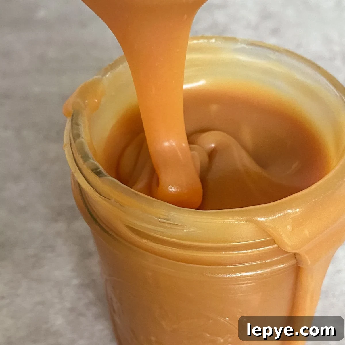 Jar of caramel topping.
