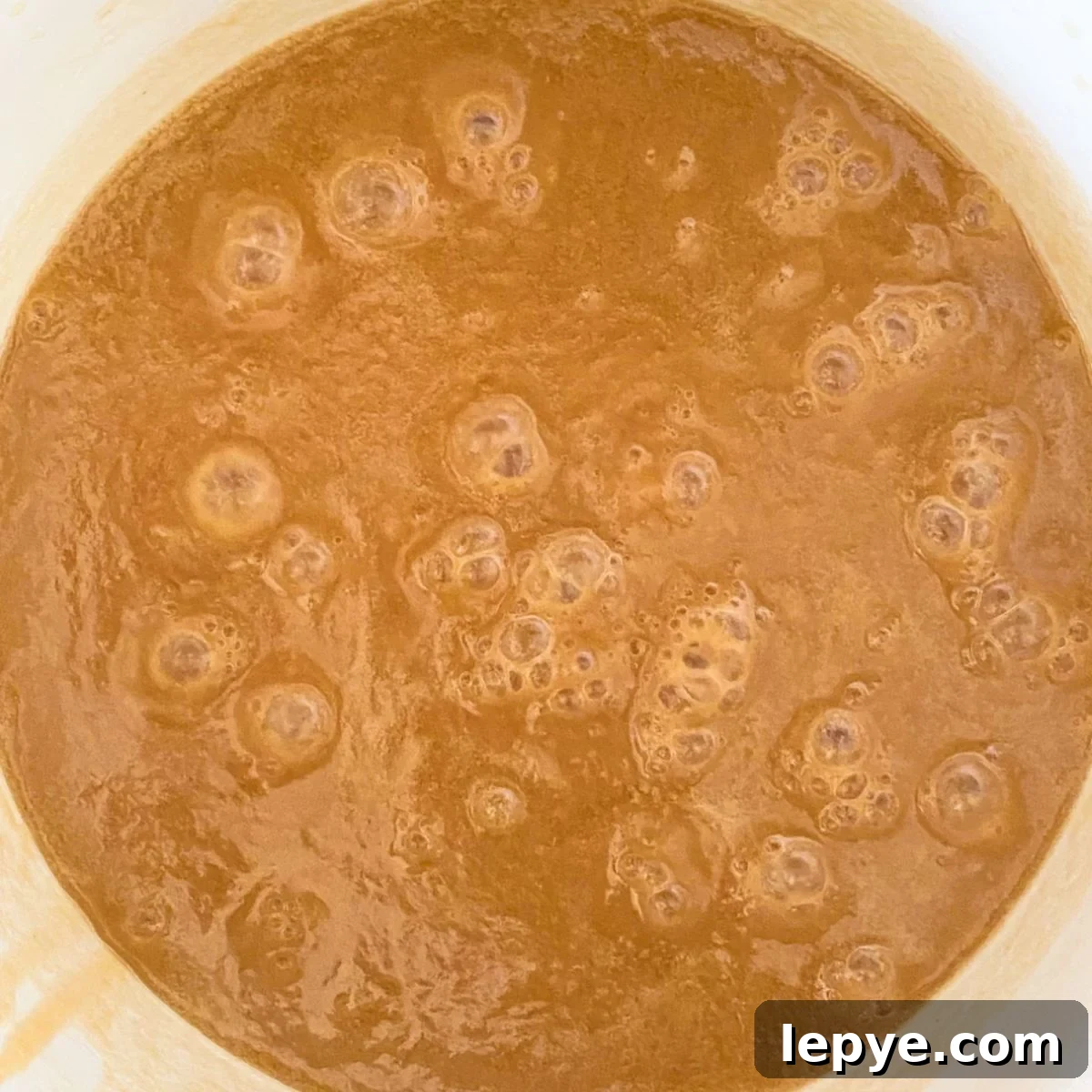 Boiling caramel.