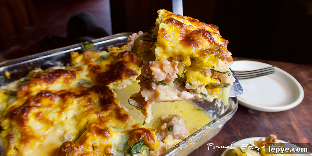 15 High-Protein Breakfasts to Power Your Morning Hustle 9 Breakfast lasagna being served at table.