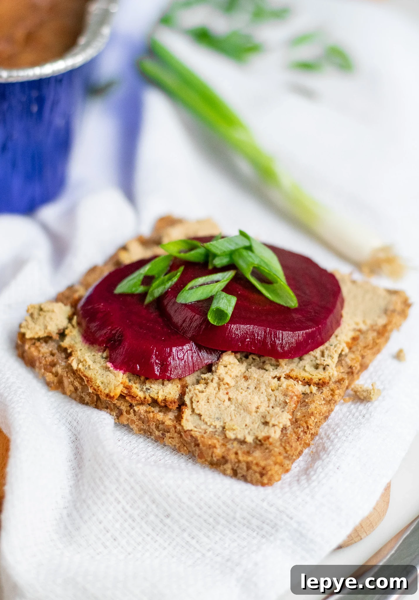How to Make Classic Danish Leverpostej (Liver Pâté) 11 Liver pate on a piece of rye bread with pickled beets on top.