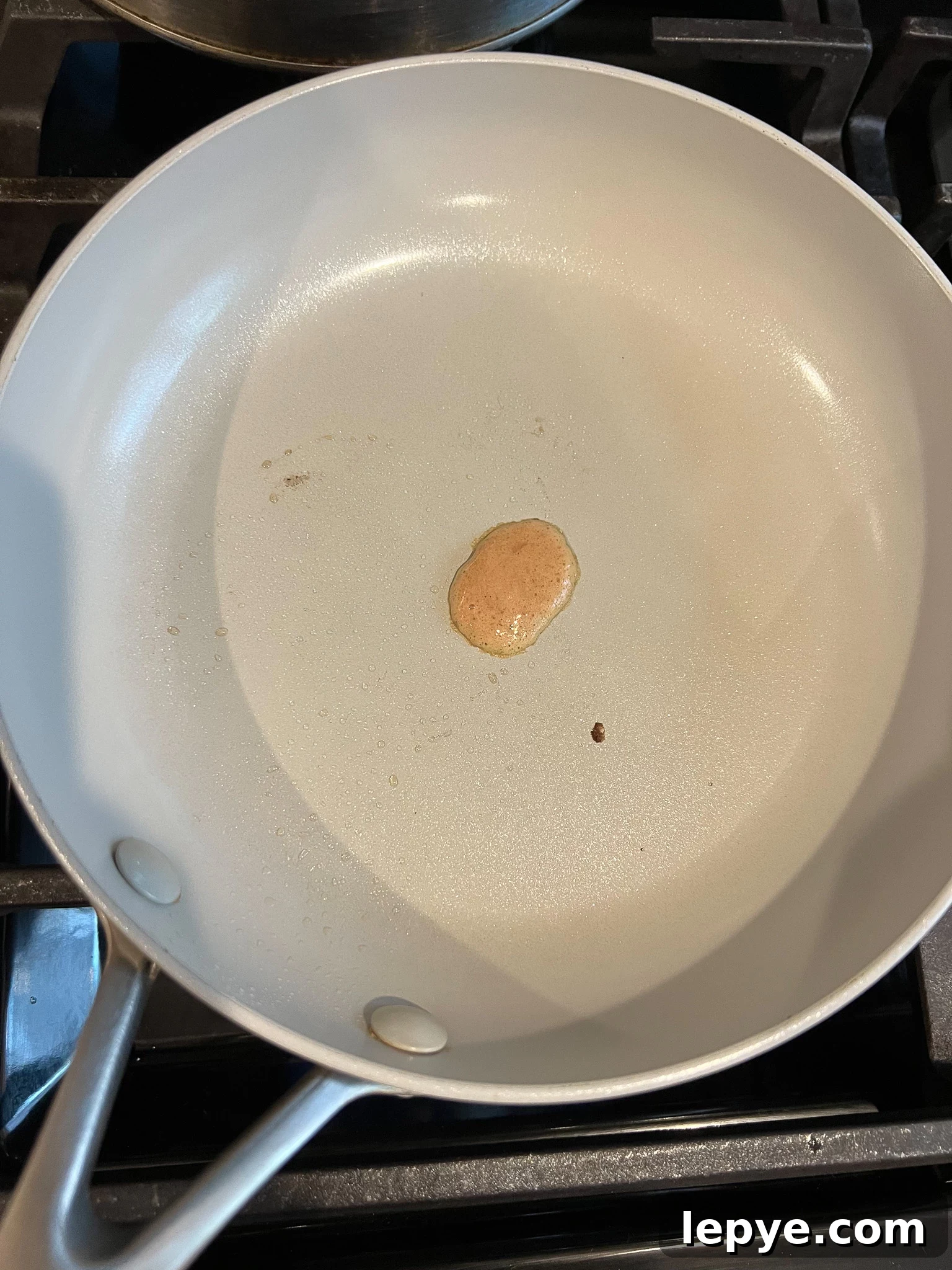 How to Make Classic Danish Leverpostej (Liver Pâté) 22 Testing a small piece of the liver mixture in the pan for seasoning.
