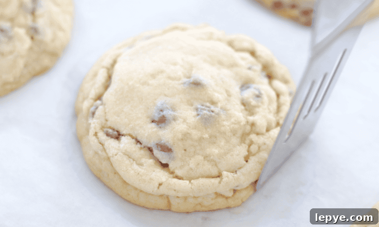spatula reshaping hot cookies